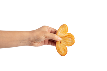 Heart shaped sugared crackers in hand on transparent background