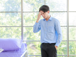 Portrait asian professional young businessman confident standing showing stressed expression male executive manager entrepreneur company executive employee owner standing in modern work office
