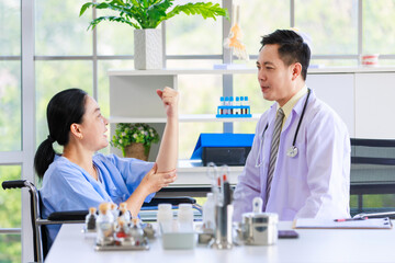 Asian male doctor in white coat with stethoscope, consulting explain medications to senior female...