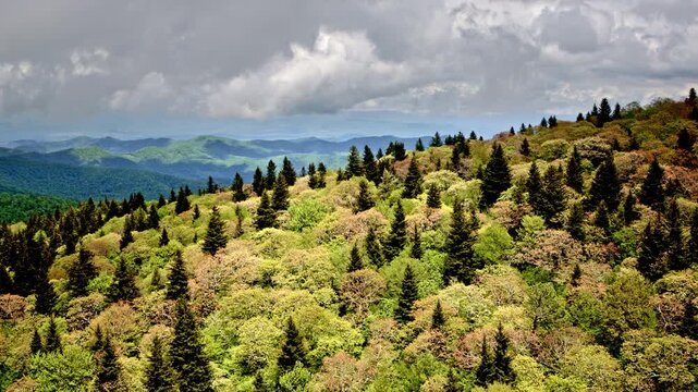 Drone ascends over foggy ridges and rainy peaks deep in the Smoky Mountain wilds.