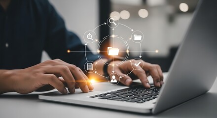 Hands typing on laptop with digital network overlay