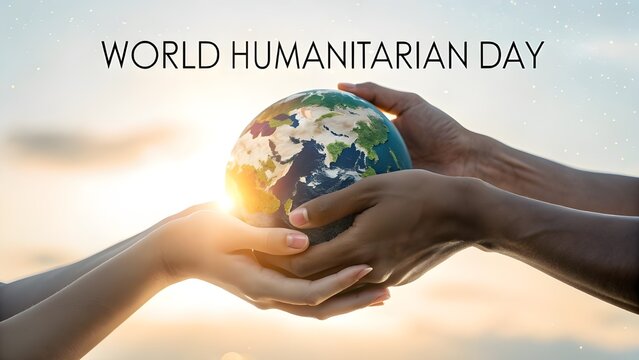 Hands holding the earth symbolizing global unity and humanitarian efforts on world humanitarian day