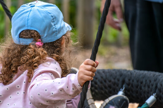 Child playing outside, good activity and sport for health and mental health - Powered by Adobe