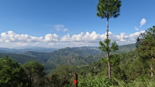 Panoramic Panning Shot of Lush Green Mountain Landscape