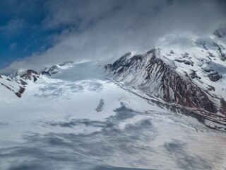 climbing mount kazbeg in georgia in summer