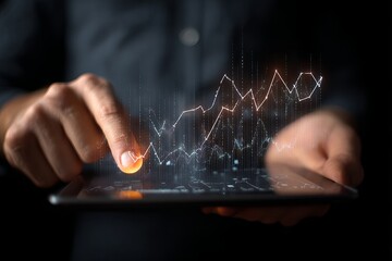 Hands interact with a tablet displaying a complex graph