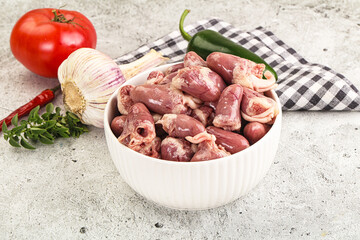 Fresh raw chicken hearts in the bowl