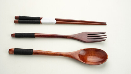Spoon, fork and chopstick, wooden cutlery 
