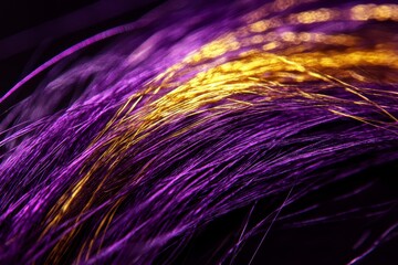 Fototapeta premium Close-up view of intricate purple and gold threads.