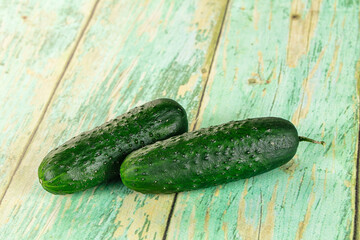 Ripe green raw two cucumbers