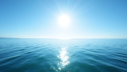 Obraz premium Bright sun shining over calm blue ocean water with reflection