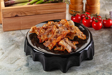 Fried crispy pork bacon snack