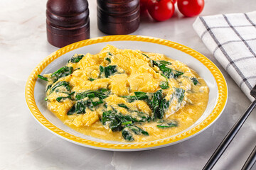 Omelette with spinach for breakfast