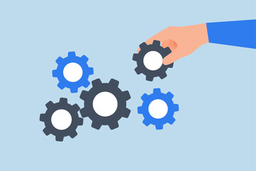 Business solution to fix problem, businessman hand put important gear to make machine run good