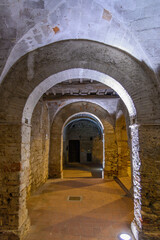 Obraz premium Cloister of San Francesco Illuminated at Night in Suvereto, Tuscany, Italy