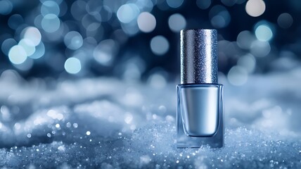A bottle of silver nail polish on an icy surface, with a dark blue background and glittering diamonds in the background.