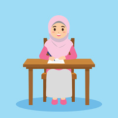 A young girl in a hijab sits at a desk, writing in a notebook.