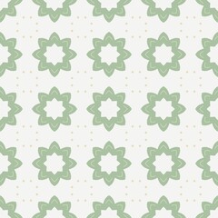 Serene geometric tile pattern featuring star shaped motifs in soft green background. Bold geometric seamless tile pattern with star motifs in vibrant green.