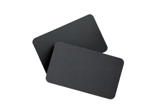 Two dark gray, rectangular, flat objects layered