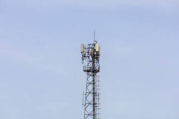 telecommunication  towers stand against a sky, modern wireless communication. for broadcasting 6G, 5G, and signals for telecommunications infrastructure, and the expansion of digital connectivity.