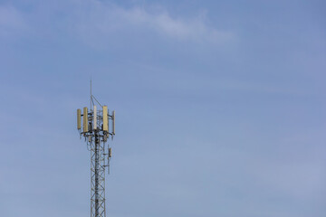 telecommunication  towers stand against a sky, modern wireless communication. for broadcasting 6G, 5G, and signals for telecommunications infrastructure, and the expansion of digital connectivity.