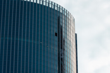 wall of a modern building with many lines on a city street