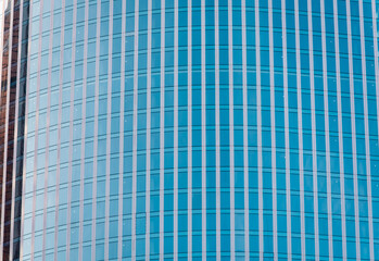 wall of a modern building with many lines on a city street