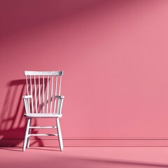 White chair against pink wall (1)