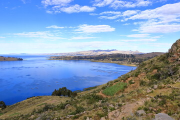 Fototapeta premium A peaceful view of Lake Titicaca from a hill near Calata, San Pablo de Tiquina, Bolivia