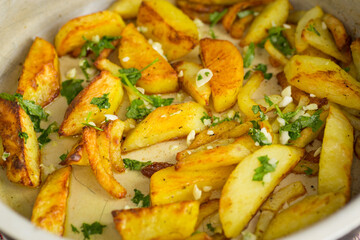 Golden potatoes with a crispy crust and spices