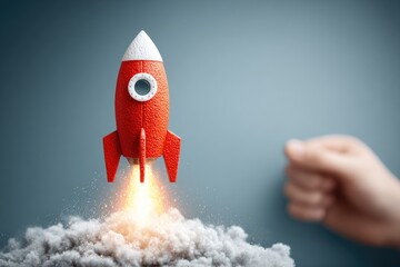 Red rocket launches, smoke, hand