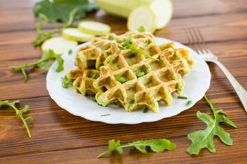 Natural vegetable waffles suitable for healthy eating on a wooden table