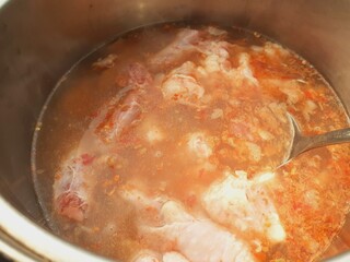 Cook meat stew in a pot