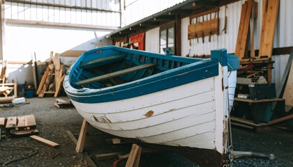 Boat's Workshop: Capturing a vintage rowboat resting on wooden supports inside a classic workshop, evoking a sense of maritime heritage and craftsmanship.