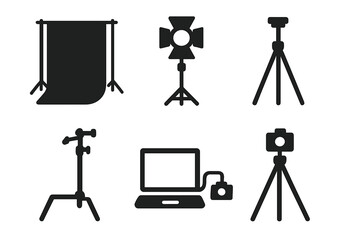Studio photography equipment icons set. Solid filled vector illustration collection of backdrop frame, studio lighting, spotlight, tripod, C-stand, computer tether for professional photo shoot setup.