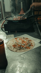 mixing kebabs before grilling them on the grill