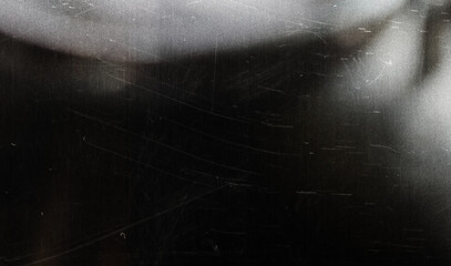 A blurry dreamy view of horizontal lines in black and white.