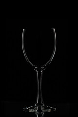 Elegant Wine Glass on Black Background. Low Key Photography