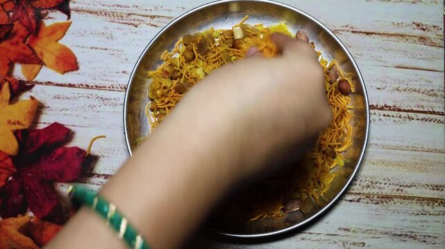 home cooked poha garnished with mixture at morning