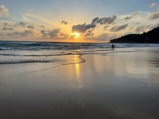 Sunset on the beach of Karon in Phuket, Thailand