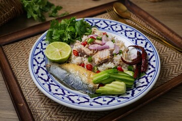 Spicy Mackerel Salad With Rice on ceramic plate