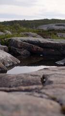 Fototapeta premium Rocky landscape with a puddle