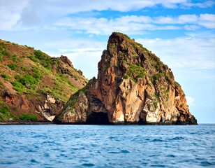 Fototapeta premium Rugged volcanic rock formations near ocean
