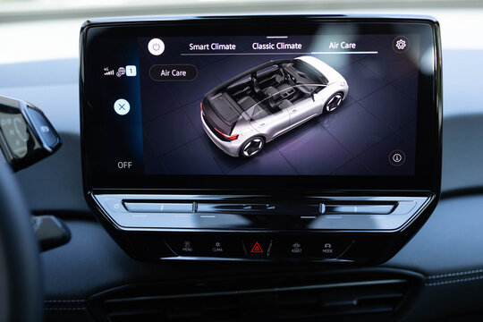 Electric car dashboard heated and ventilated seats. Modern LCD with fully digital temperature dashboard panel with air condition temperature ventilation Heated steering wheel. Control panel on Screen - Powered by Adobe