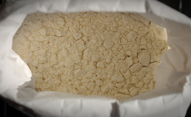 Semi-wholemeal flour in a paper bag
