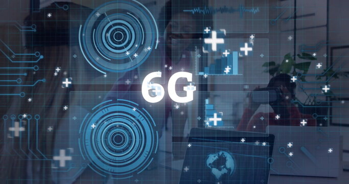 Projecting 6G holographic interface and digital world map dominating office workspace, with laptops