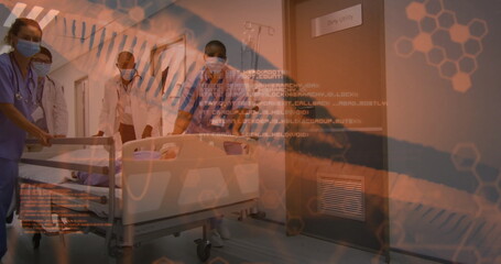 Wheeling masked team pushing gurney with IV pole down hospital corridor, orange digital overlays