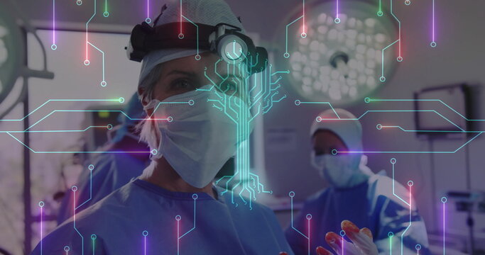 Standing female surgeon wearing mask cap lamp and gloves in operating room, with circuit overlay - Powered by Adobe