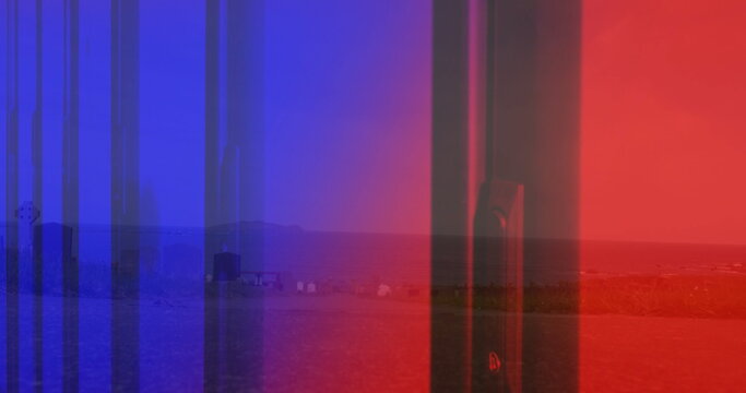 Showing smartphone backside silhouette hovering over coastal plain, with colored glitch bars