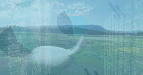Showing white spinner and blade sitting on grass runway at airstrip, with digital code overlay